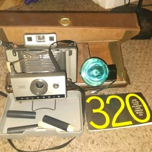 Antique polaroid camera 320 land camera with case